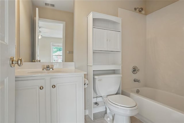 2802 Arabian Trl NE, Marietta, GA 30062 - bathroom with toilet, vanity,  shower combination, ceiling fan, and tile patterned flooring
