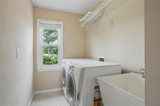 2802 Arabian Trl NE, Marietta, GA 30062 - laundry area with independent washer and dryer, baseboards, and light tile patterned floors