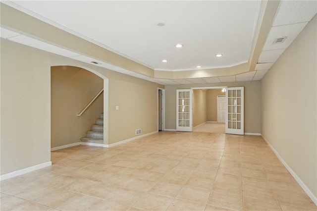 2802 Arabian Trl NE, Marietta, GA 30062 - empty room featuring french doors, light tile patterned floors, a tray ceiling, recessed lighting, and stairway