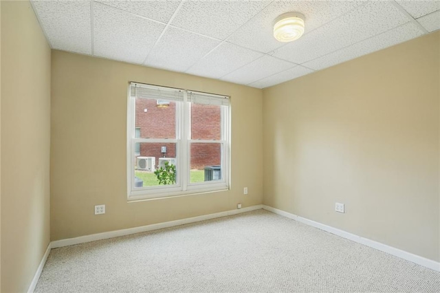 2802 Arabian Trl NE, Marietta, GA 30062 - carpeted empty room with a paneled ceiling and baseboards