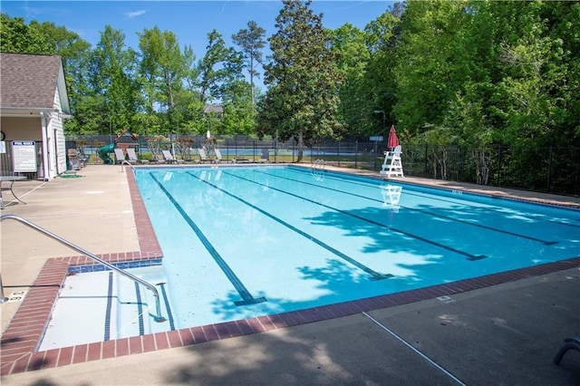 2802 Arabian Trl NE, Marietta, GA 30062 - community pool with a patio area and view of wooded area