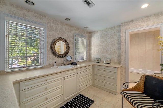 bathroom with vanity, tile patterned floors, and visible vents