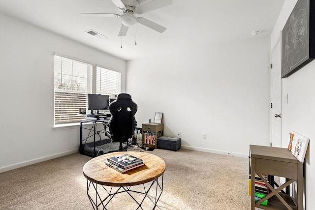 home office featuring carpet floors and ceiling fan