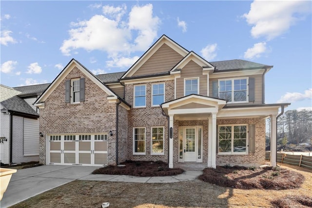 5997 Creek Indian Dr, Sugar Hill, GA 30518 - view of front facade with concrete driveway, brick siding, and an attached garage