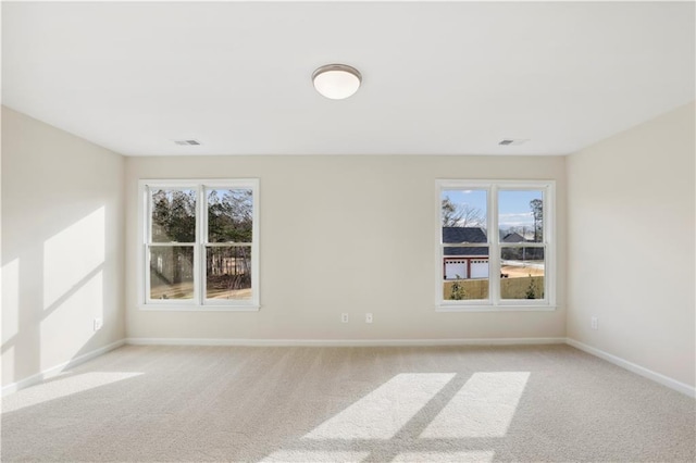 5997 Creek Indian Dr, Sugar Hill, GA 30518 - empty room featuring light colored carpet