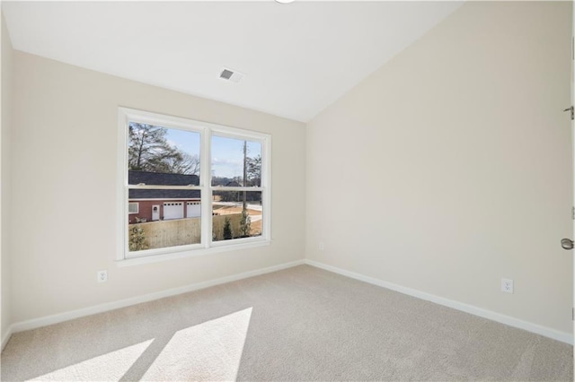 5997 Creek Indian Dr, Sugar Hill, GA 30518 - spare room with light colored carpet and lofted ceiling
