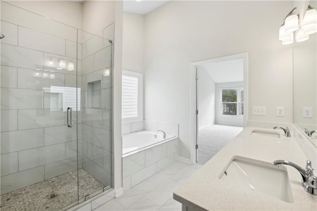 5997 Creek Indian Dr, Sugar Hill, GA 30518 - bathroom with a garden tub, a stall shower, and double vanity