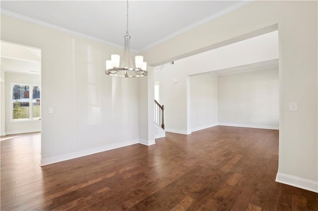 5997 Creek Indian Dr, Sugar Hill, GA 30518 - unfurnished room featuring a chandelier, dark wood finished floors, crown molding, and stairway