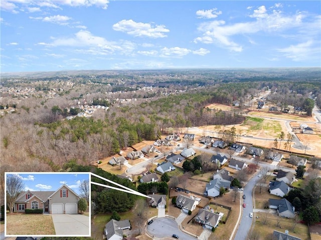 drone / aerial view with a residential view