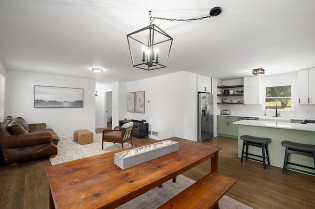 3142 Chamblee Gap Rd, Cumming, GA 30040 - dining area featuring dark wood-style flooring and a chandelier