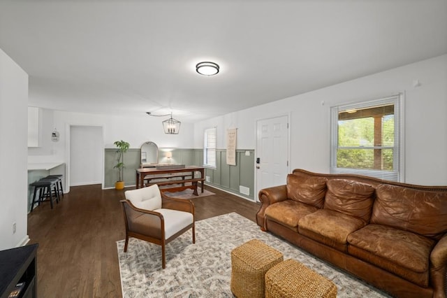 3142 Chamblee Gap Rd, Cumming, GA 30040 - living area with dark wood-style floors and wainscoting