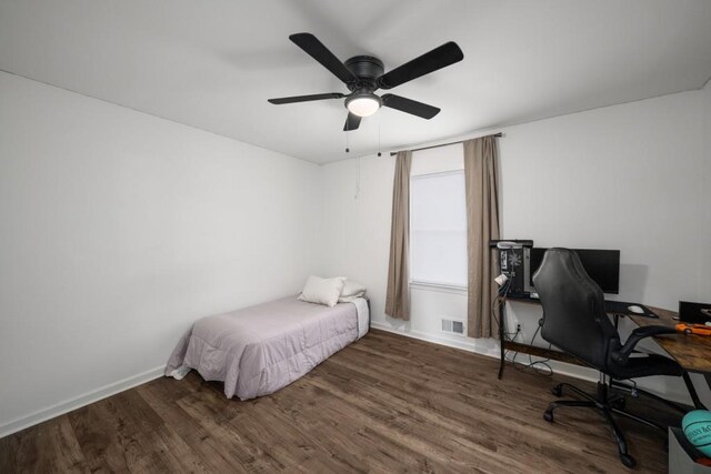 3142 Chamblee Gap Rd, Cumming, GA 30040 - bedroom with wood finished floors, baseboards, an office area, and a ceiling fan