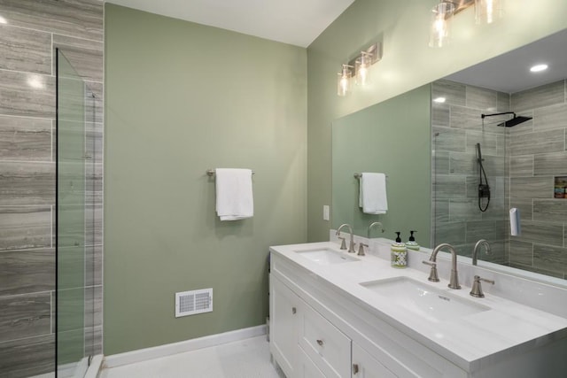 3142 Chamblee Gap Rd, Cumming, GA 30040 - full bathroom with double vanity, tiled shower, and baseboards
