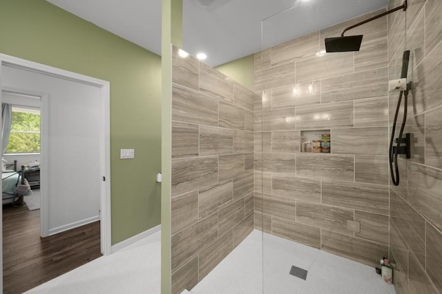 3142 Chamblee Gap Rd, Cumming, GA 30040 - bathroom featuring tiled shower and wood finished floors