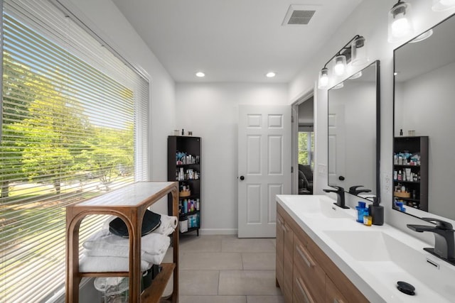 3142 Chamblee Gap Rd, Cumming, GA 30040 - full bath with double vanity, tile patterned floors, baseboards, and recessed lighting