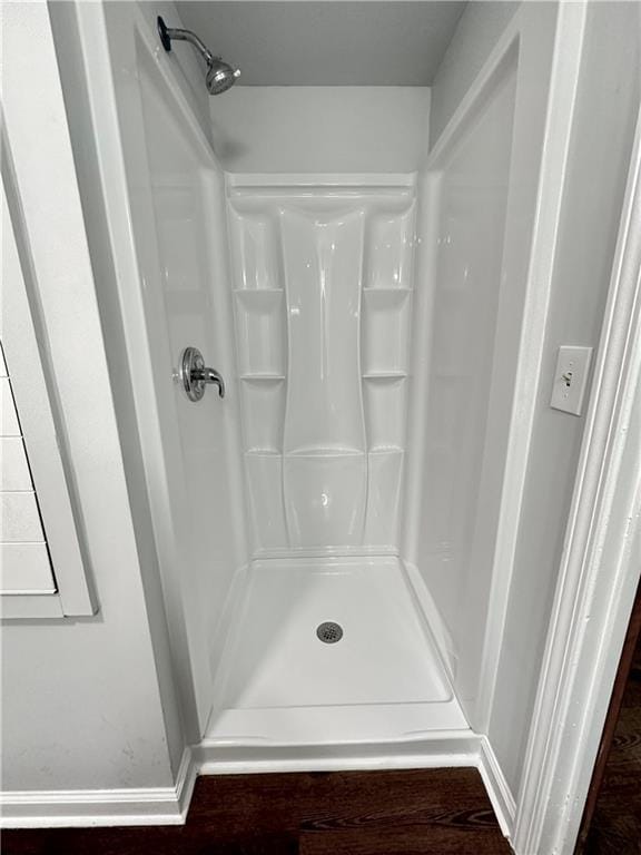 bathroom featuring walk in shower