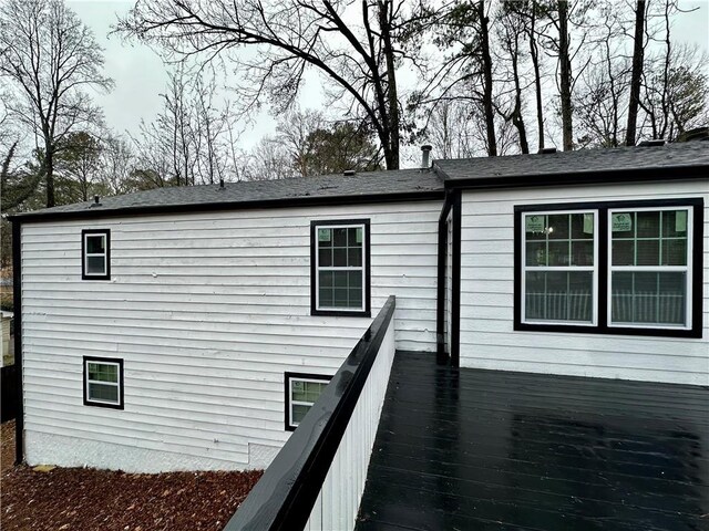 view of home's exterior featuring a deck