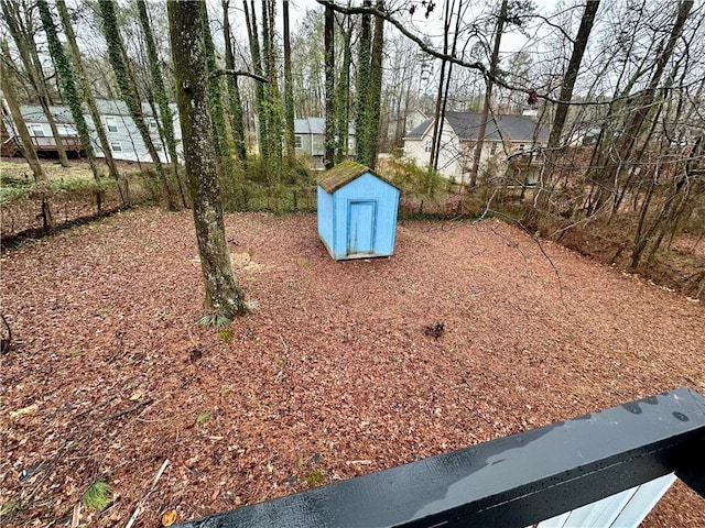 view of yard with a shed