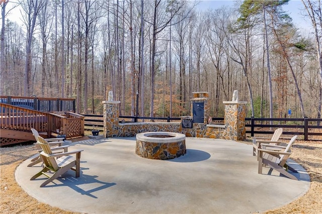 view of patio with an outdoor fire pit