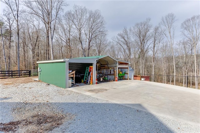 view of side of home with a carport