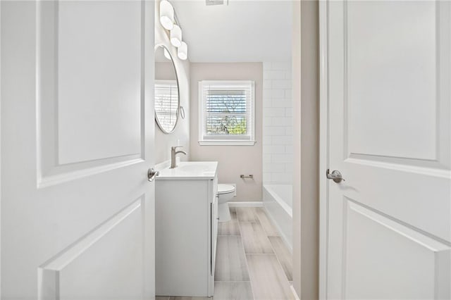 full bathroom featuring vanity, toilet, and shower / bathing tub combination