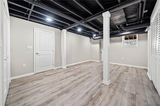 basement featuring wood-type flooring