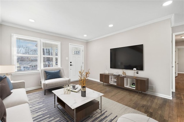 living room featuring dark hardwood / wood-style flooring and ornamental molding