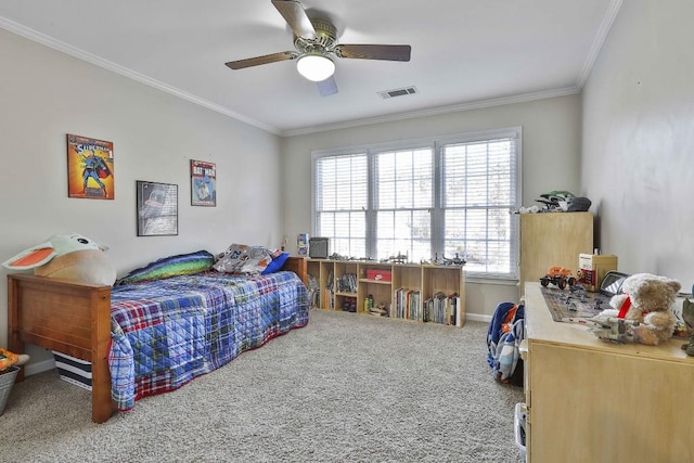 bedroom featuring visible vents, a ceiling fan, carpet flooring, and crown molding