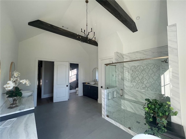 bathroom with an enclosed shower, vanity, beam ceiling, and high vaulted ceiling