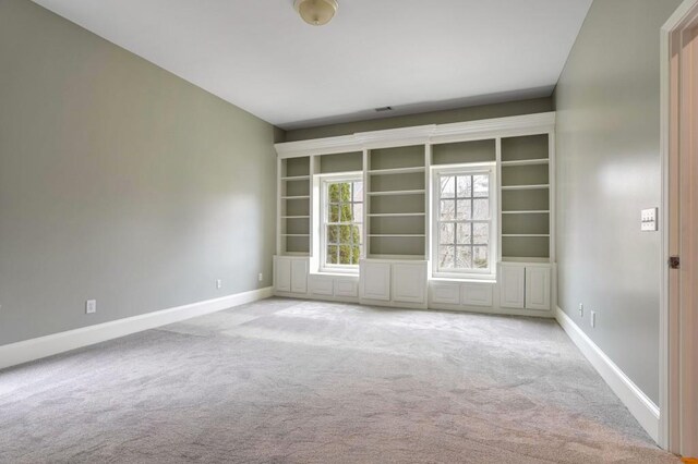 spare room featuring dark hardwood / wood-style flooring