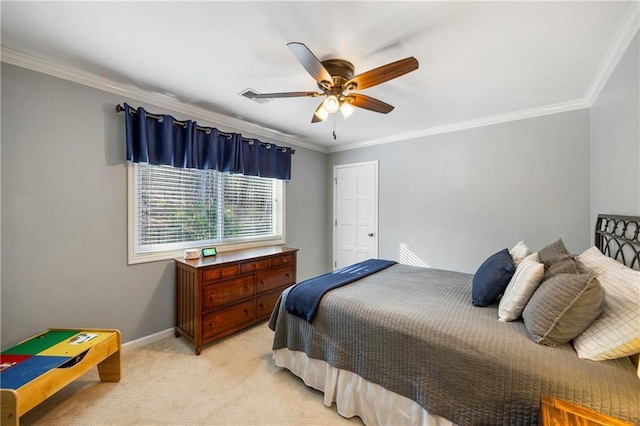 bedroom featuring light carpet, ceiling fan, baseboards, and ornamental molding