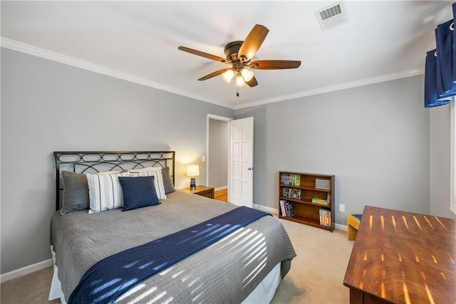 carpeted bedroom featuring visible vents, ceiling fan, baseboards, and ornamental molding