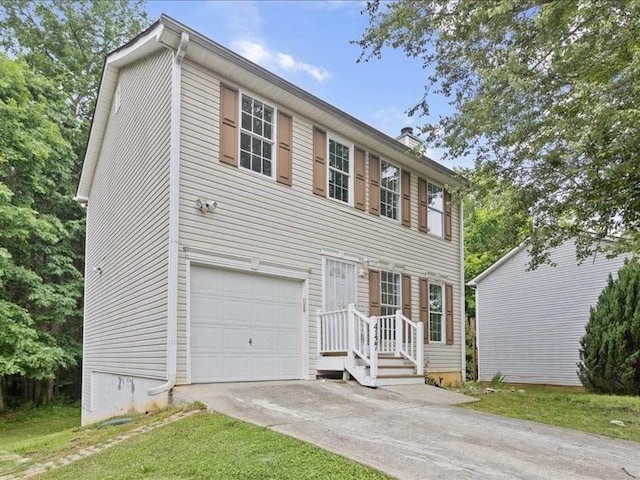 colonial home with a garage