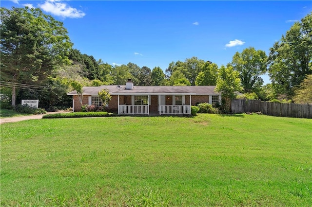 315 Pleasant Grove Rd, Mcdonough, GA 30252 - ranch-style house featuring a porch, brick siding, and a chimney