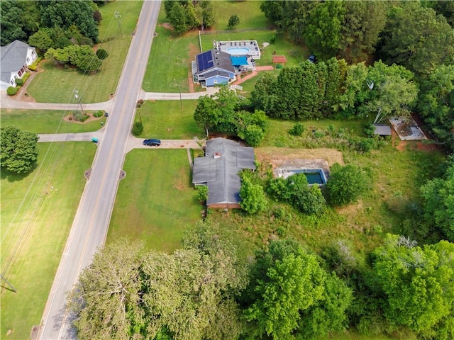315 Pleasant Grove Rd, Mcdonough, GA 30252 - aerial view of property and surrounding area with a tree filled landscape