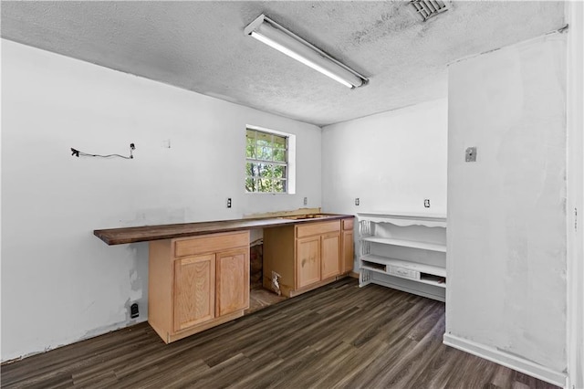 315 Pleasant Grove Rd, Mcdonough, GA 30252 - unfurnished office featuring a textured ceiling, dark wood finished floors, and a sink