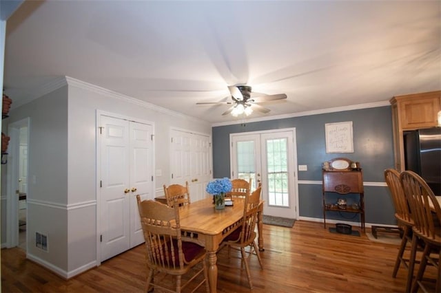 10 Stagg Trce, Social Circle, GA 30025 - dining room featuring a ceiling fan, wood finished floors, baseboards, and crown molding