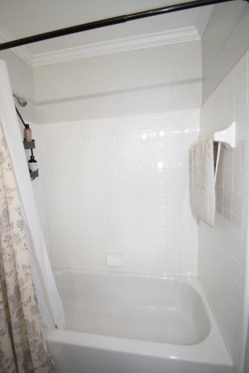 10 Stagg Trce, Social Circle, GA 30025 - full bathroom with ornamental molding and shower / bath combo