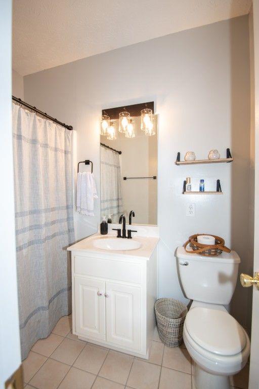 10 Stagg Trce, Social Circle, GA 30025 - bathroom with tile patterned flooring, toilet, and vanity