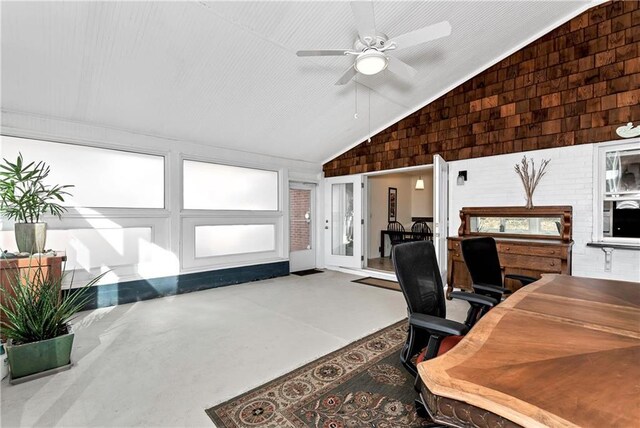 home office with ceiling fan and lofted ceiling