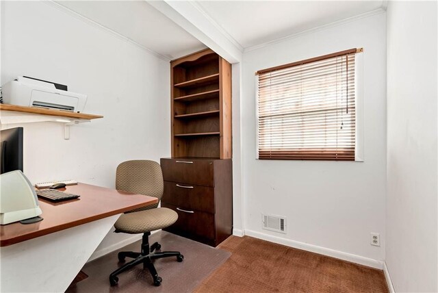 carpeted office space with ornamental molding