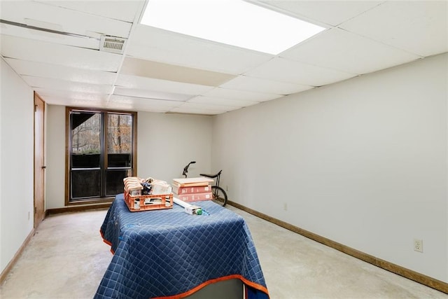 bedroom featuring a drop ceiling