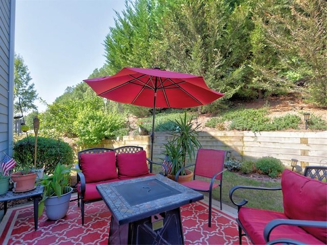 view of patio with fence and an outdoor hangout area