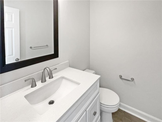 3968 Oak Glenn Dr, Duluth, GA 30096 - half bath with toilet, vanity, baseboards, and tile patterned floors