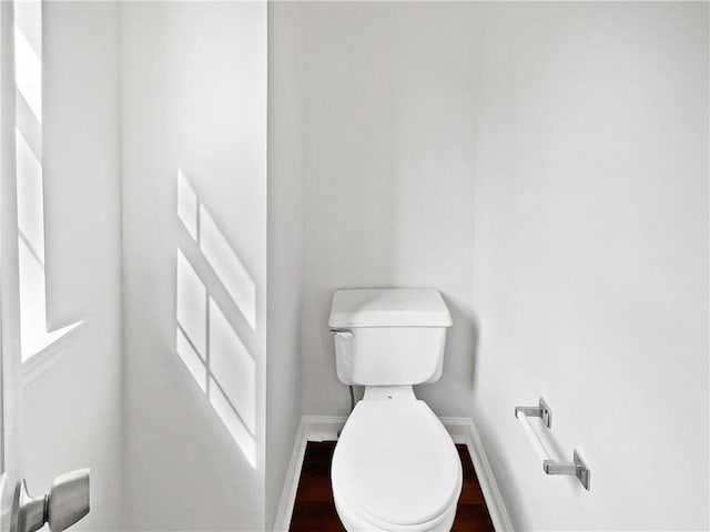 3968 Oak Glenn Dr, Duluth, GA 30096 - bathroom with baseboards, toilet, and wood finished floors