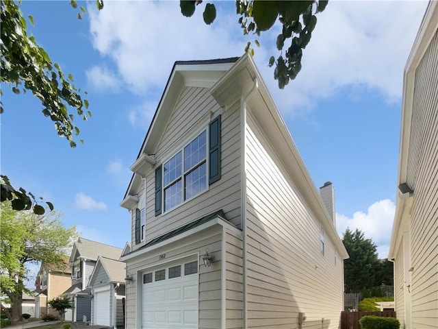 3968 Oak Glenn Dr, Duluth, GA 30096 - view of property exterior with a garage