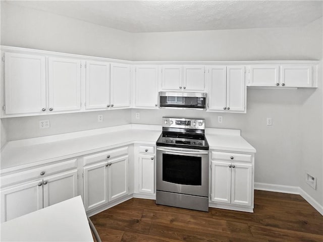 3968 Oak Glenn Dr, Duluth, GA 30096 - kitchen with appliances with stainless steel finishes, white cabinetry, dark wood finished floors, light countertops, and a textured ceiling