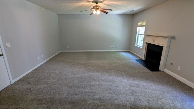 3881 Micah Ln, Ellenwood, GA 30294 - unfurnished living room with a ceiling fan, carpet floors, a textured ceiling, and baseboards