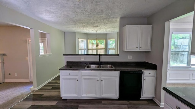 3881 Micah Ln, Ellenwood, GA 30294 - kitchen featuring black dishwasher, a sink, dark countertops, white cabinetry, and dark wood-type flooring