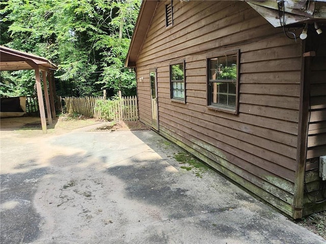 418 Honey Suckle Ln, Stockbridge, GA 30281 - view of side of property with a patio